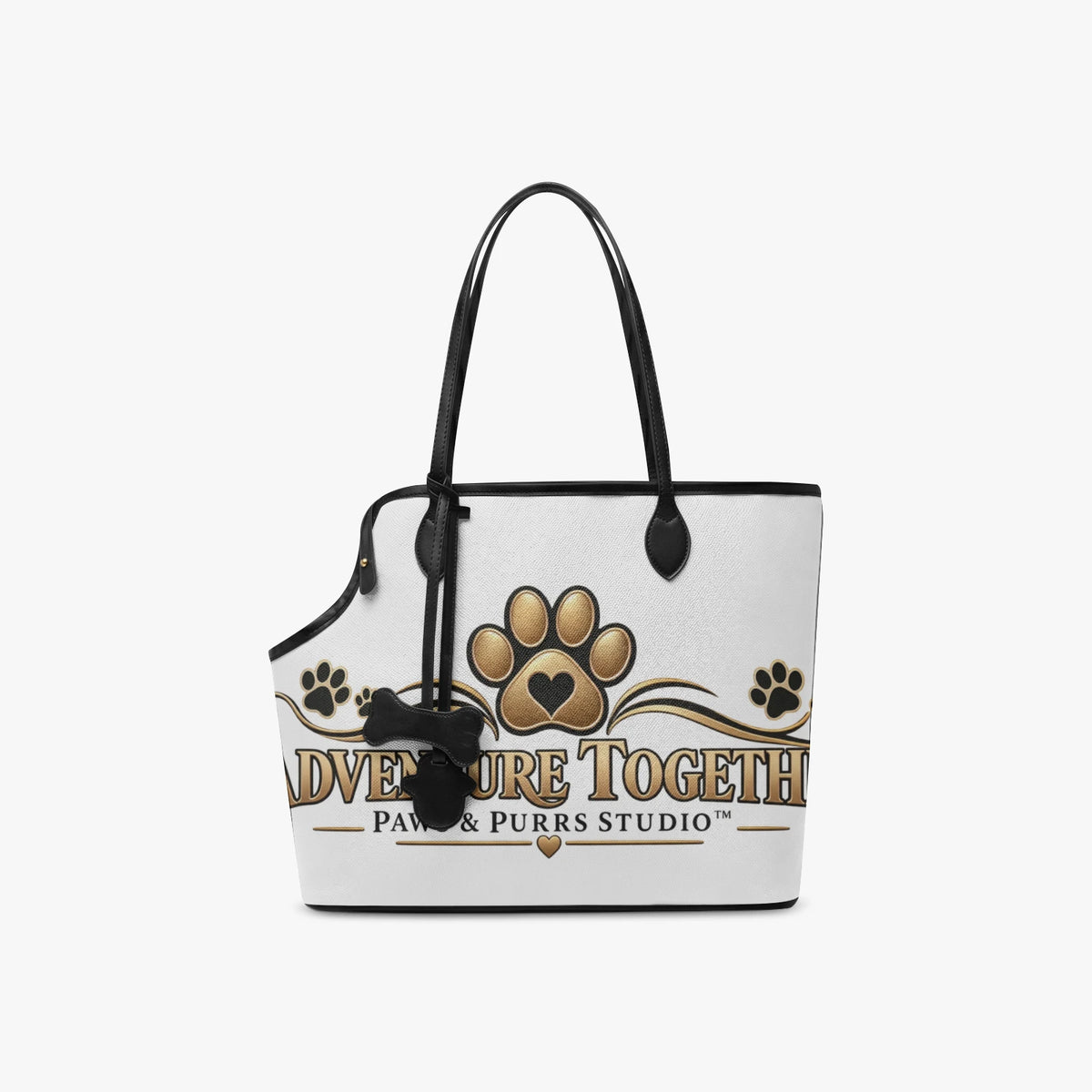 Front view of the Adventure Together pet carrier tote with gold lettering, paw artwork and black handles.