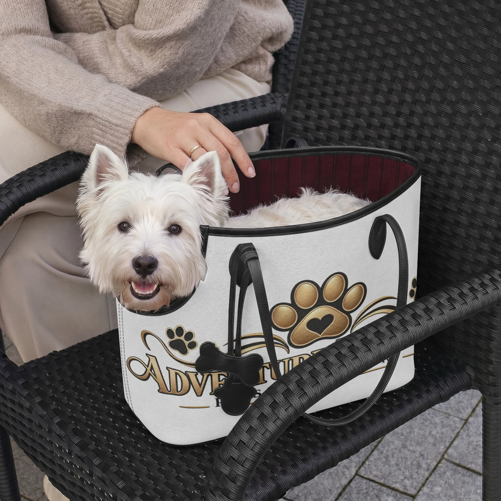 White dog looking out of the Adventure Together pet carrier tote on a black woven chair.